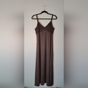 Super stretchy long black dress with chest detail. Size medium.